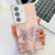 Samsung Galaxy A16 5G Plating Glitter Lens Film Texture Butterfly Holder Wristband Phone Case - Pink Feathers Samsung Galaxy A16 5G Plating Glitter Lens Film Texture Butterfly Holder Wristband Phone Case - Pink Feathers