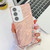 Samsung Galaxy S25 5G Plating Glitter Texture Chain Wristband TPU Phone Case with Lens Film - Pink Water Ripples