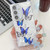 Samsung Galaxy S25 5G Plating Texture Butterfly Wristband TPU Phone Case with Glitter Lens Film - Blue Butterflies HU3 Samsung Galaxy S25 5G Plating Texture Butterfly Wristband TPU Phone Case with Glitter Lens Film - Blue Butterflies HU3