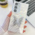 Samsung Galaxy S24 FE Plating Glitter Texture Butterfly Holder TPU Phone Case with Lens Film - White Water Ripples