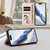 iPhone 17 Pro Embossed Heart Cat Leather Phone Case with Hand Strap - Pink