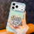 iPhone 17 Diamond Glitter Gemstone Heart Holder Phone Case - Light Pink