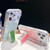 iPhone 17 Rhinestone Glitter TPU 4-corners Anti-fall Phone Case with Holder - Light Pink