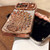iPhone 17 Pro Max Electroplated TPU Peacock Relief Rhinestone Glitter Phone Case with Lens Film - Black