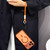 iPhone 17 Pro Max Large Window Matte Electroplated TPU MagSafe Phone Case with Hand Strap - Orange