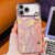 iPhone 17 Pro Max Plating Feather Texture Wristband Holder TPU Phone Case with Lens Film - Pink