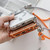 iPhone 17 Pro Max Rhinestone Clear Acrylic Electroplated Magnetic Phone Case with Right-Side Crossbody Lanyard - Orange