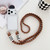 iPhone 17 Pro Max Transparent Acrylic Shockproof Phone Case with Crossbody Lanyard - Brown