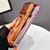 iPhone 17 Pro Large Window Matte Electroplated TPU MagSafe Phone Case with Hand Strap - Orange