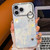 iPhone 17 Pro Plating Foil-like Metallic Texture Wristband Holder TPU Phone Case with Lens Film - Silver