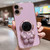 iPhone 17 Embrace Stars Electroplating Astronaut Holder Phone Case - Purple