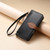 iPhone 17 Leaf Buckle Zipper Wallet Leather Phone Case with Strap - Black