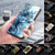 iPhone 17e / 16e Crystal-Like Painted Vegan Leather Phone Case - Christmas Tree