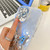 iPhone 17e / 16e Plating Glitter Texture Butterfly Holder TPU Phone Case with Lens Film - White Wrinkles