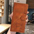 iPhone 17e / 16e Triangles Embossed Leather Phone Case - Brown
