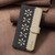 Google Pixel 11 / Pixel 11 Pro Splicing Color Hollow Flower Pattern RFID Leather Phone Case - Black