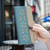iPhone 18 Pro Max / 17 Pro Max Splicing Color Hollow Flower Pattern RFID Leather Phone Case - Green