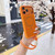 iPhone 18 Pro Color Contrast Magnetic Phone Case with Wrist Strap - Orange