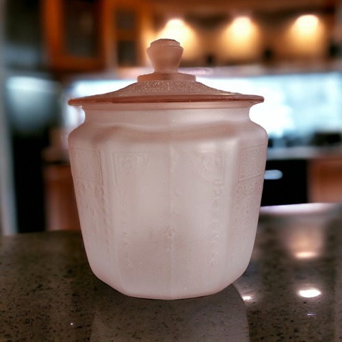 https://cdn11.bigcommerce.com/s-2hcjsv8mjq/images/stencil/500x659/products/1774/11797/Anchor_Hocking_Princess_Pink_Satin_Depression_Glass_Cookie_Jar_Lid_1__33680.1701354961.png?c=2