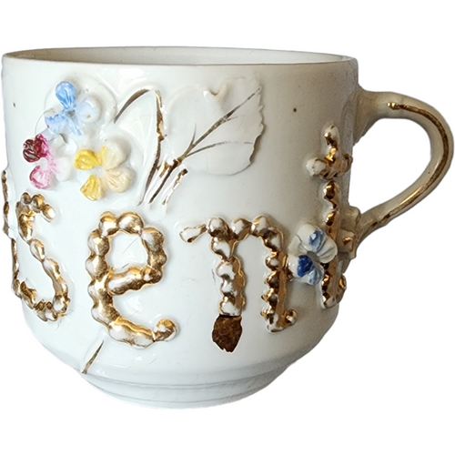 West Germany Porcelain Mustache Cup with Raised Floral and Gilt Decoration
