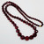 Red Cherry Amber Bakelite 28.5" Faceted Graduated Bead Necklace