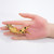 Oscar de la Renta Crystal and Resin Cabochon Fish in Gold