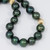 Tahitian Green Pearl Strand Necklace with 14 Karat Yellow Gold Accents and Clasp