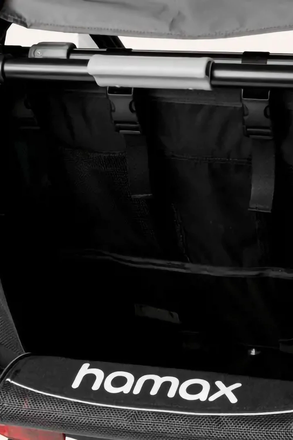 Hamax Outback 2-seat rear storage compartment open showing ample cargo space for family outings