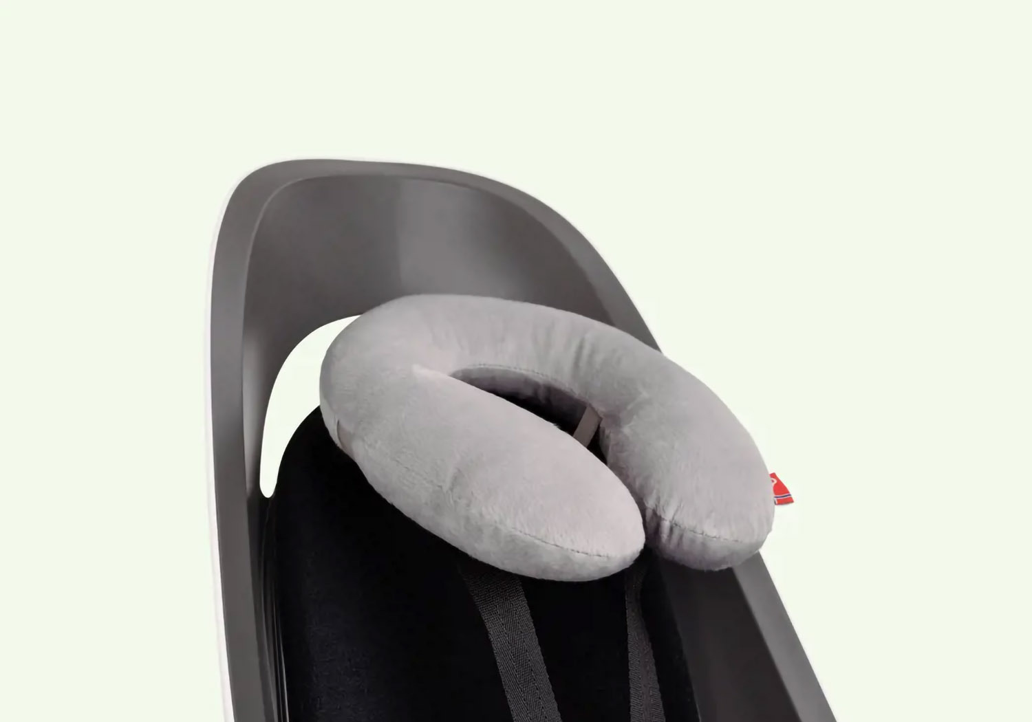 Hamax Amiga frame-mounted bike seat with neck pillow accessory fitted to harness