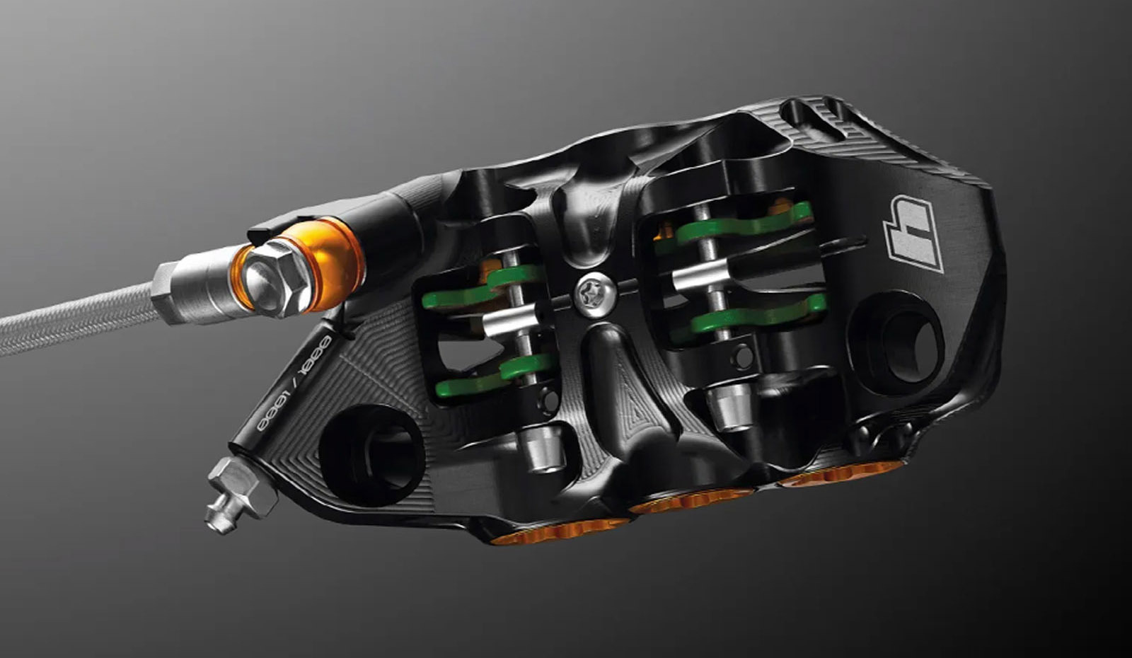 Hope EVO V6Ti calliper front view showing six piston layout, green pad springs and Hope logo