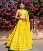 Yellow color Silk Fabric Lehenga Choli