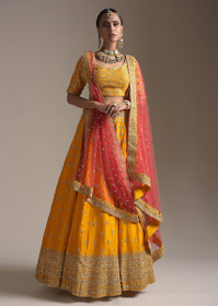 Yellow color Silk Fabric Lehenga Choli