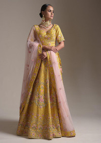 Yellow color Silk Fabric Lehenga Choli