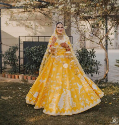 Yellow color Silk Fabric Lehenga Choli