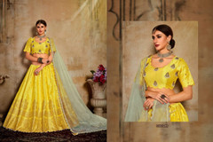 Yellow color Silk Fabric Lehenga Choli