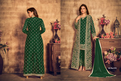 Dark Green color Heavy Net Fabric Embroidered Party Wear Suit