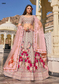 Pink color Net Fabric Heavily Embroidered Lehenga Choli