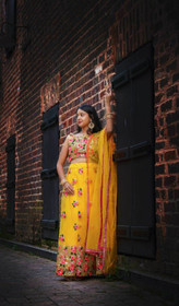 Yellow color Net Fabric Lehenga Choli