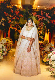 Powder Peach color Net Fabric Lehenga Choli