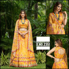 Yellow color Organza Fabric Lehenga Choli