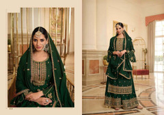 Dark Green color Heavily Embroidered Chinnon Fabric Party Wear Suit