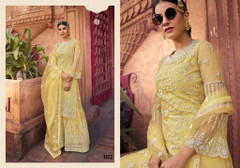 Yellow color Heavily Embroidered Party wear Net Fabric Suit