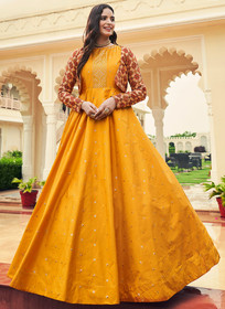 Beautiful Mustard Yellow Sequence Embroidered Anarkali Gown With Jacket
