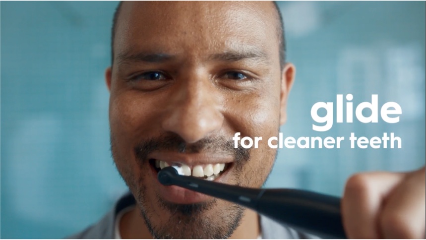 Redheaded girl smiling wide