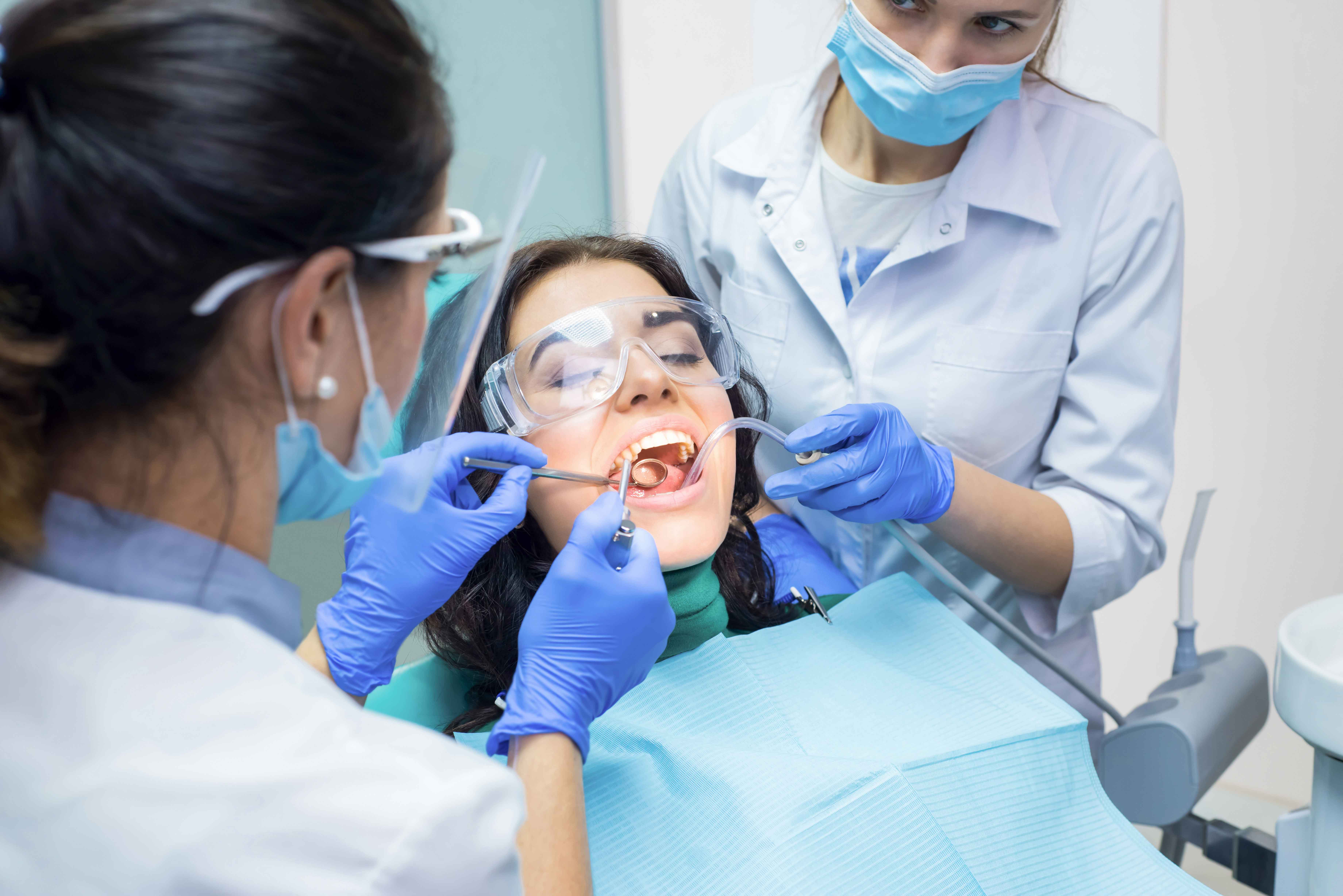 Woman receiving a professional dental cleaning