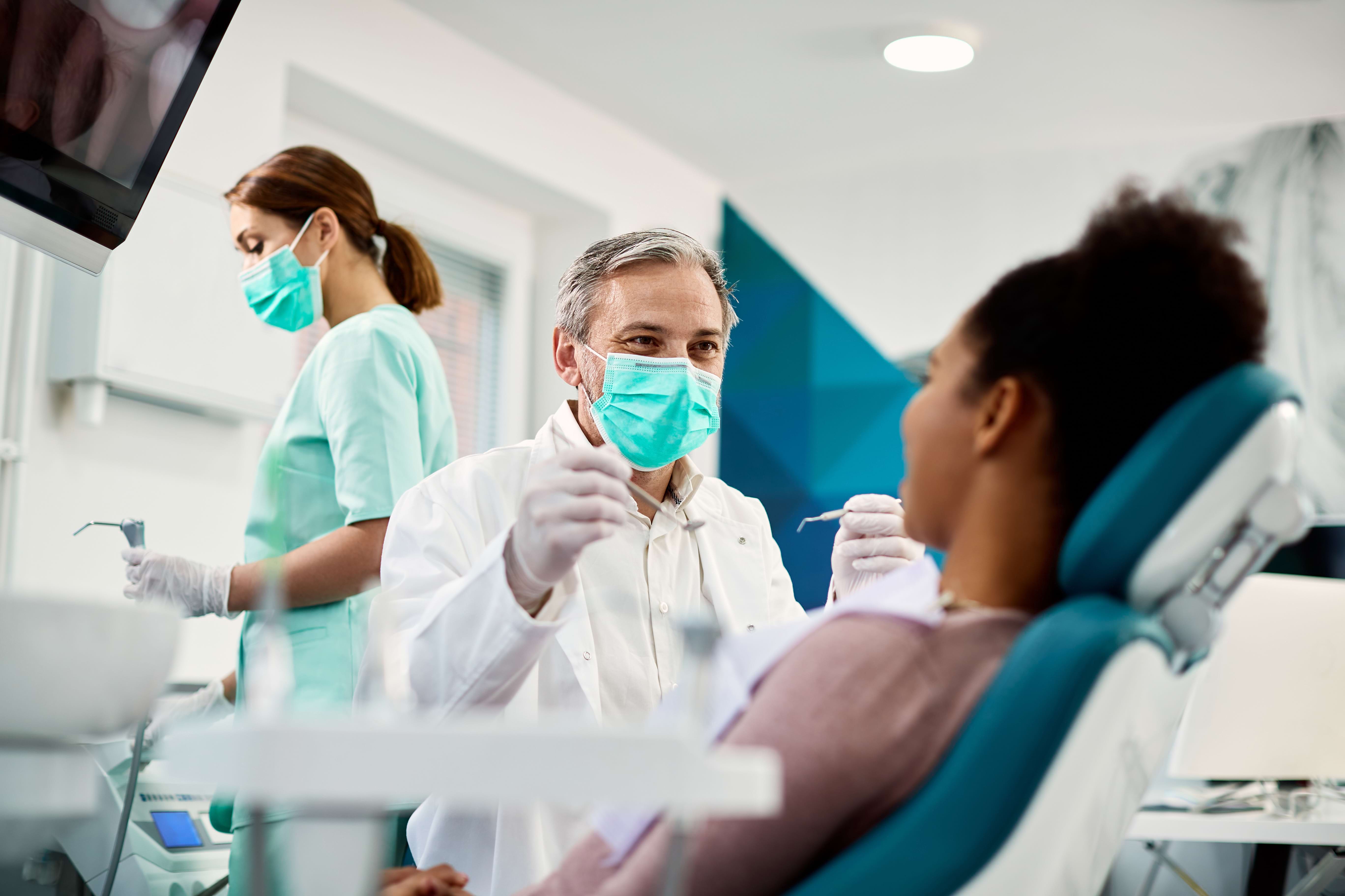 Man getting his teeth professionally whitened