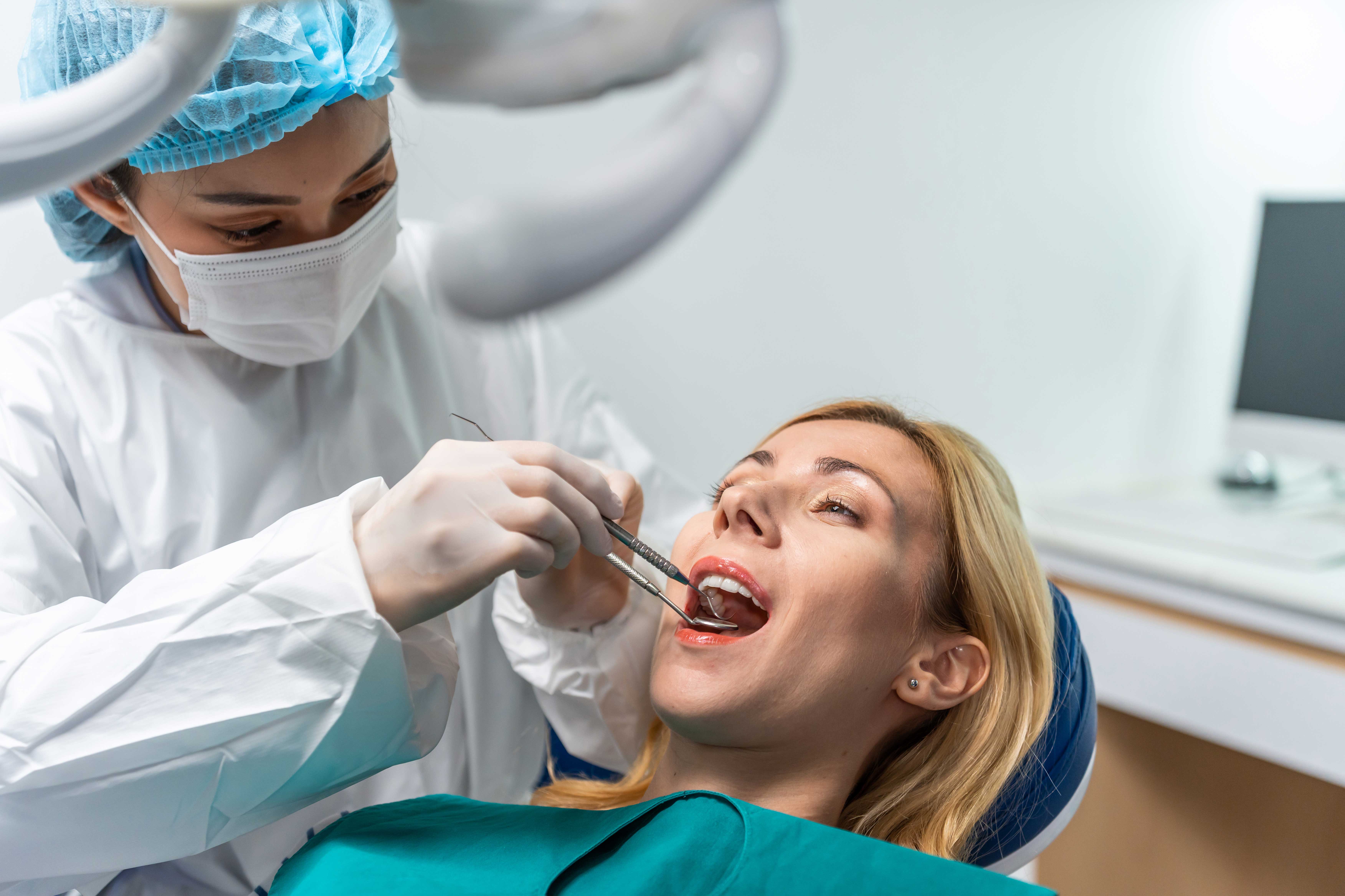 Woman being examined by a dentist