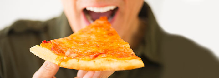 How to Eat Pizza With Dentures  