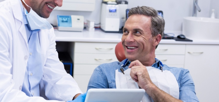 Dentist showing patient results.