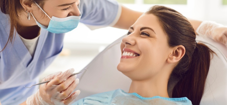 Dentist professional with patient checking their oral health